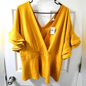 Yellow peplum top